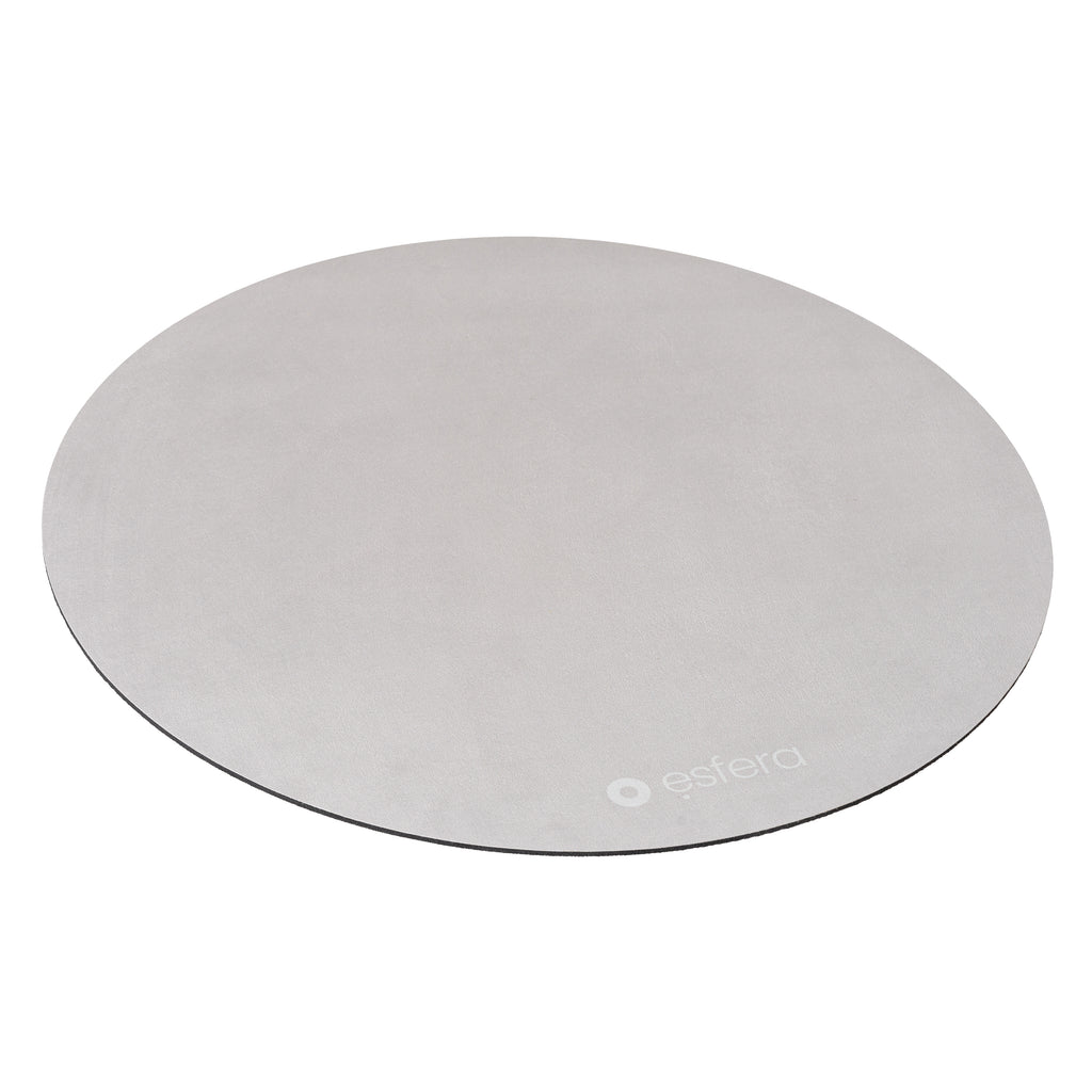 A champagne coloured sit/stand stability mat used for standing desks and under your ball chair on slippery surfaces.