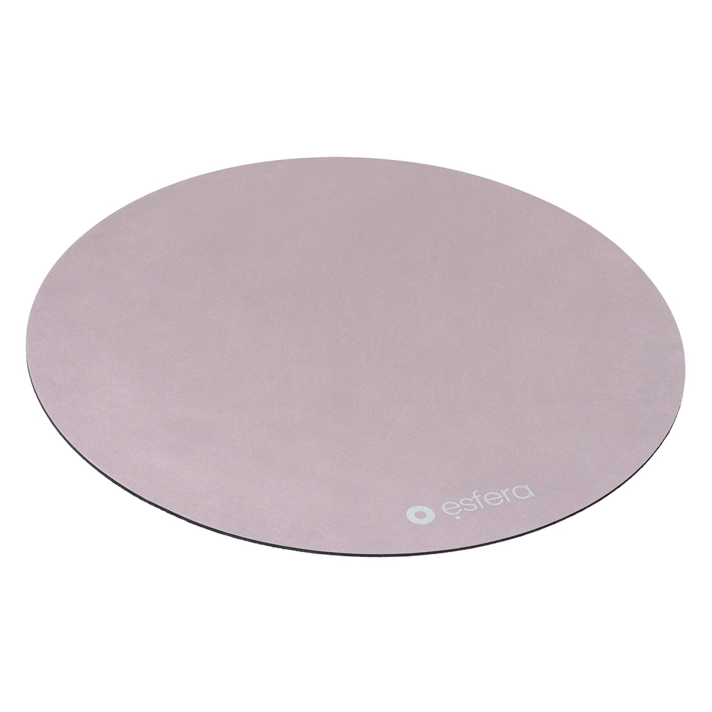 A dusty pink sit/stand stability mat used for standing desks and under your ball chair on slippery surfaces.